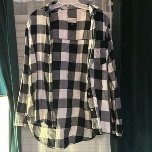 Medium plaid black, grey and white button up shirt.